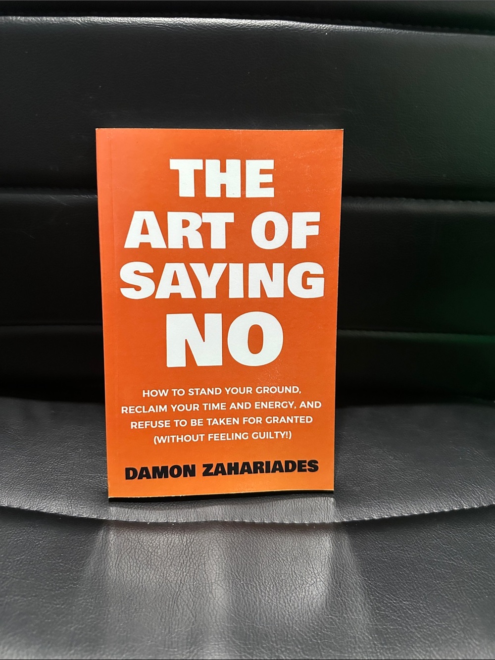 Book “The Art of Saying No” by Damon Zahariades - Orange Cover